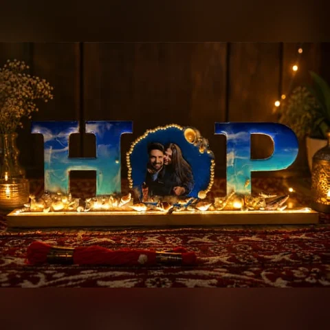 Couple initial letter lamp in ocean-blue resin with a couple photo by Jhilmil Decor